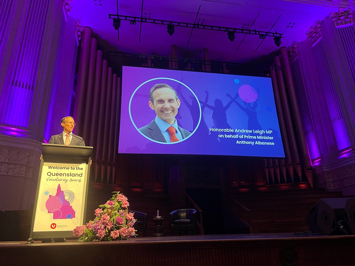 Andrew Leigh on stage at Qld Volunteering awards