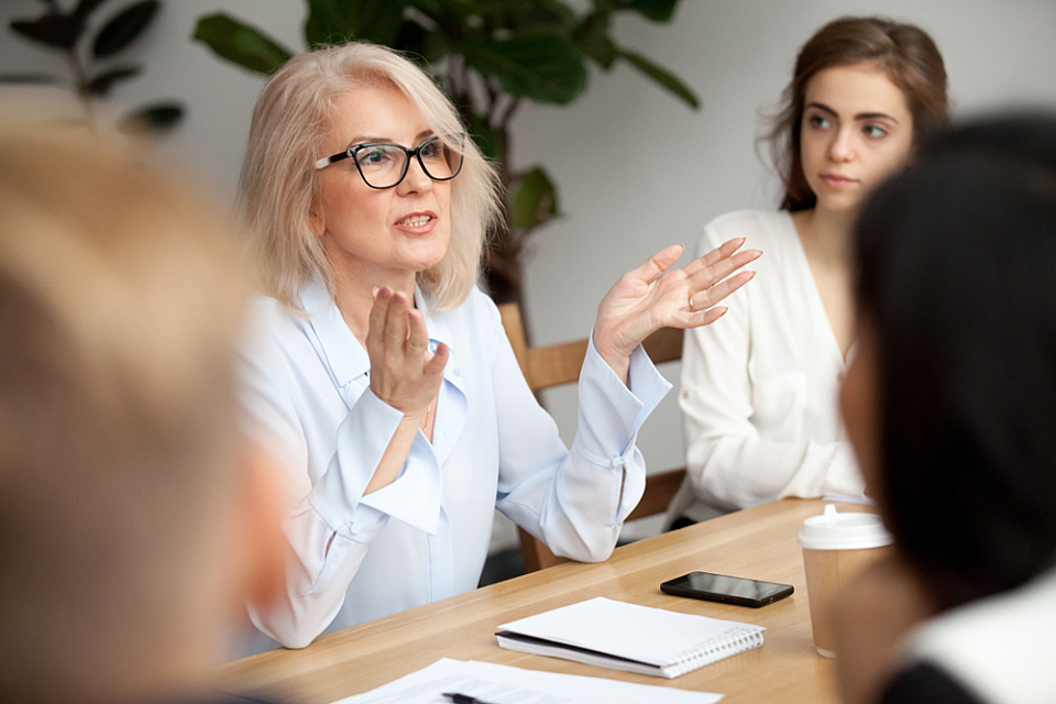 Negotiation Meeting Woman shutterstock 1043108527