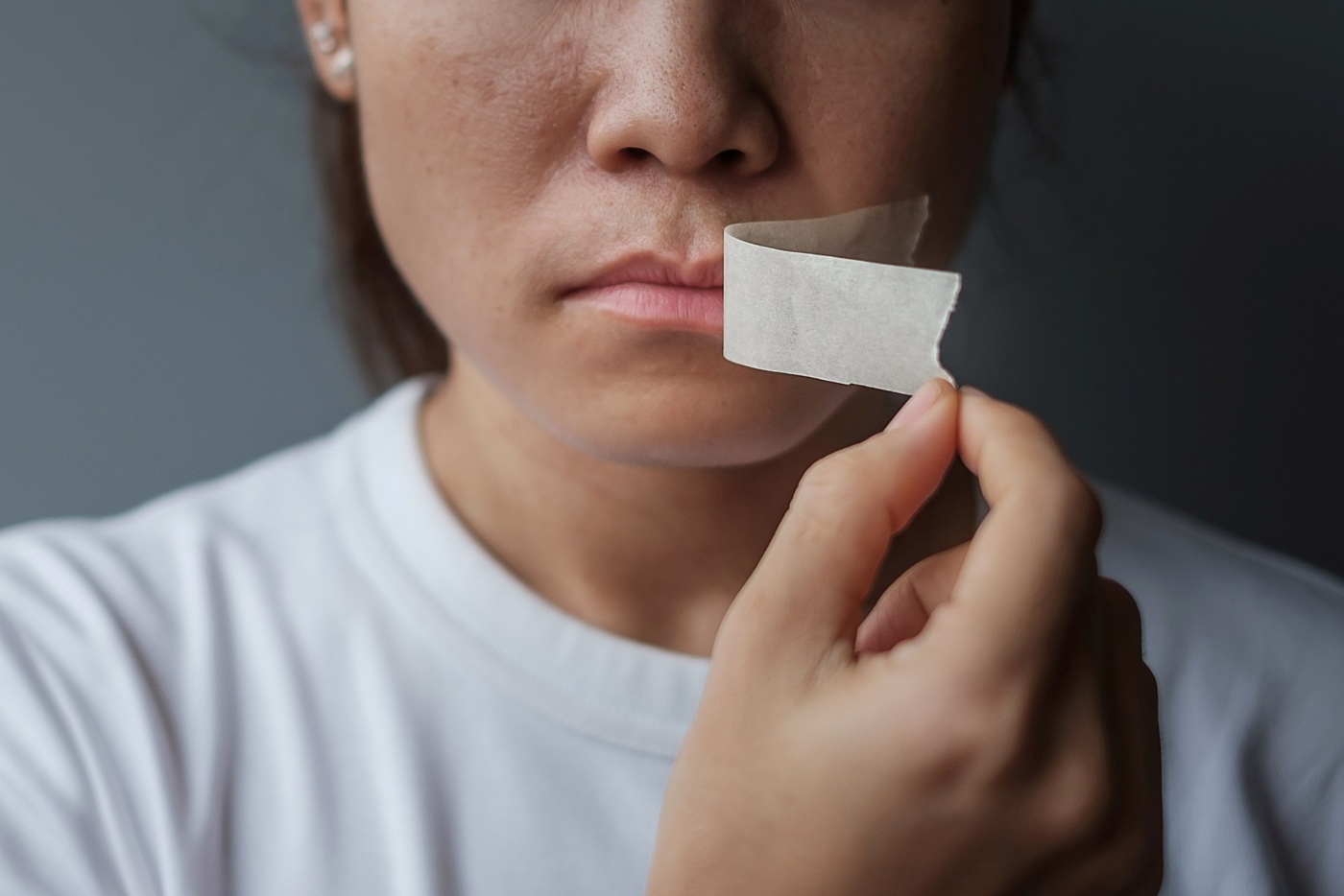 Enforced silence sealed lips