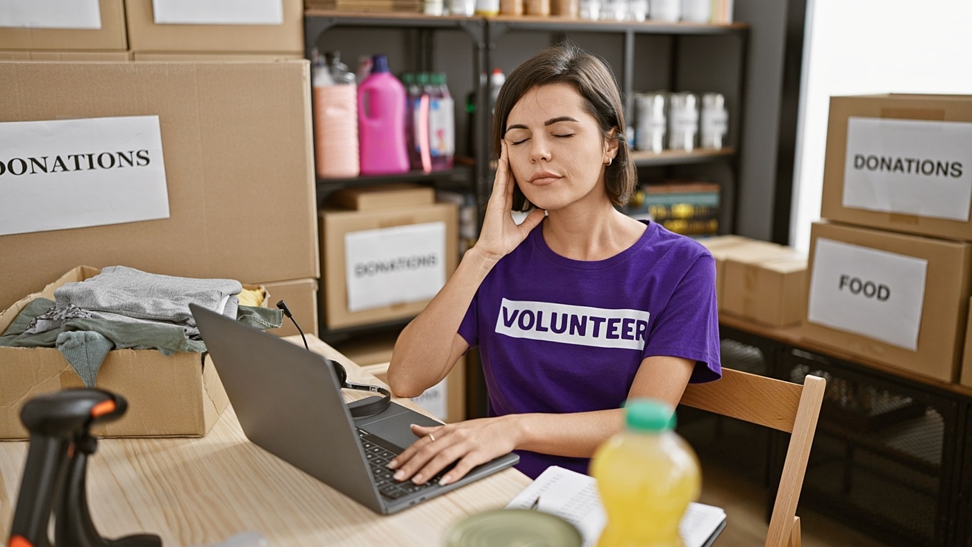 Stressed charity worker