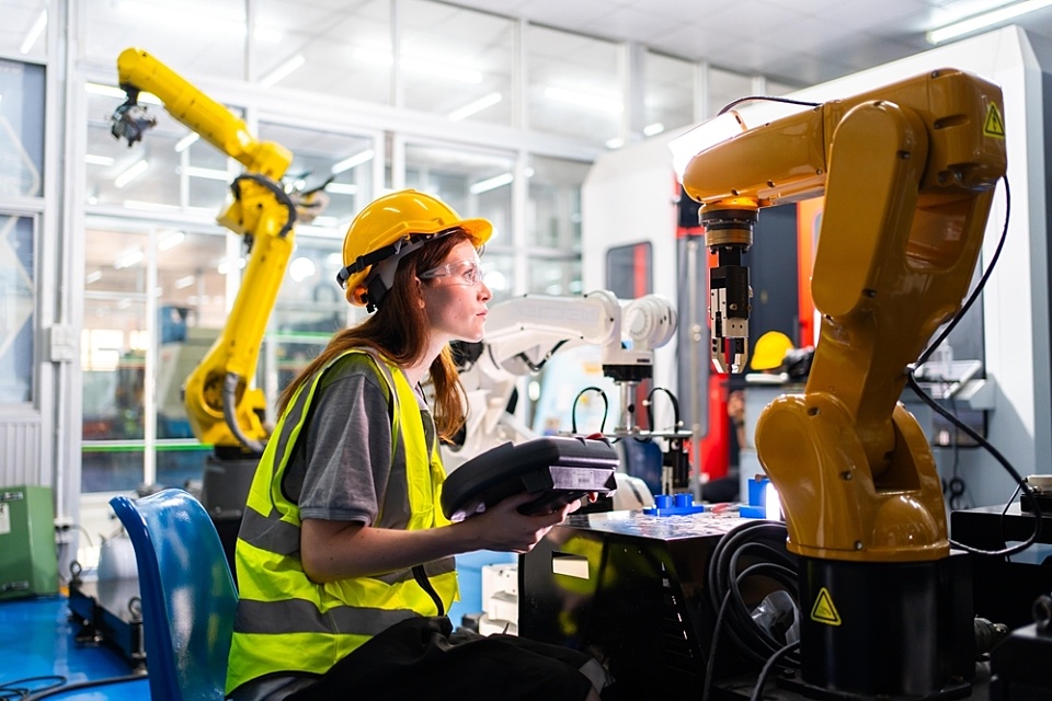 Factory Robots Engineer hutterstock 2488204067